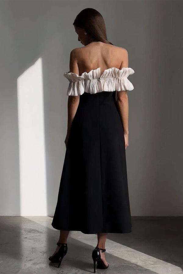 Robe midi noire à volants