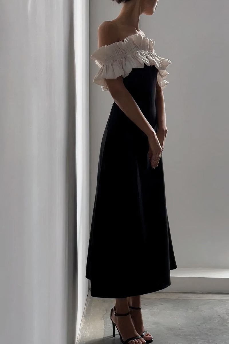 Robe midi noire à volants