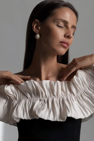 Robe midi noire à volants