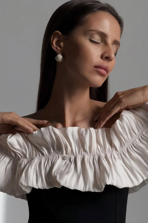 Robe midi noire à volants