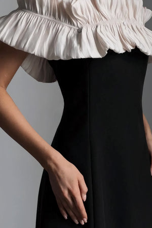 Robe midi noire à volants