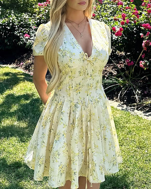 Robe mini jaune à manches bouffantes