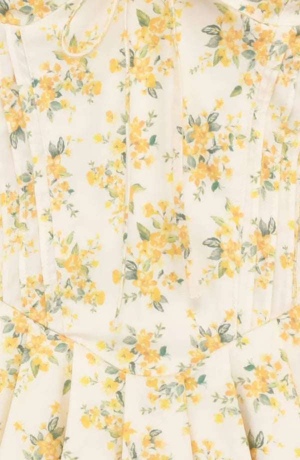 Robe mini jaune à manches bouffantes